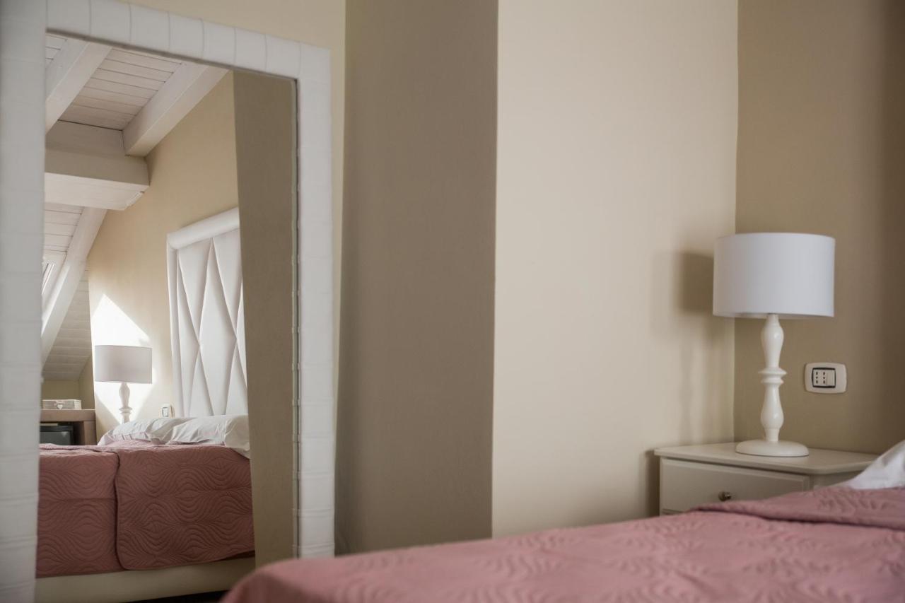 Attico Hotel กานิกัตติ ภายนอก รูปภาพ